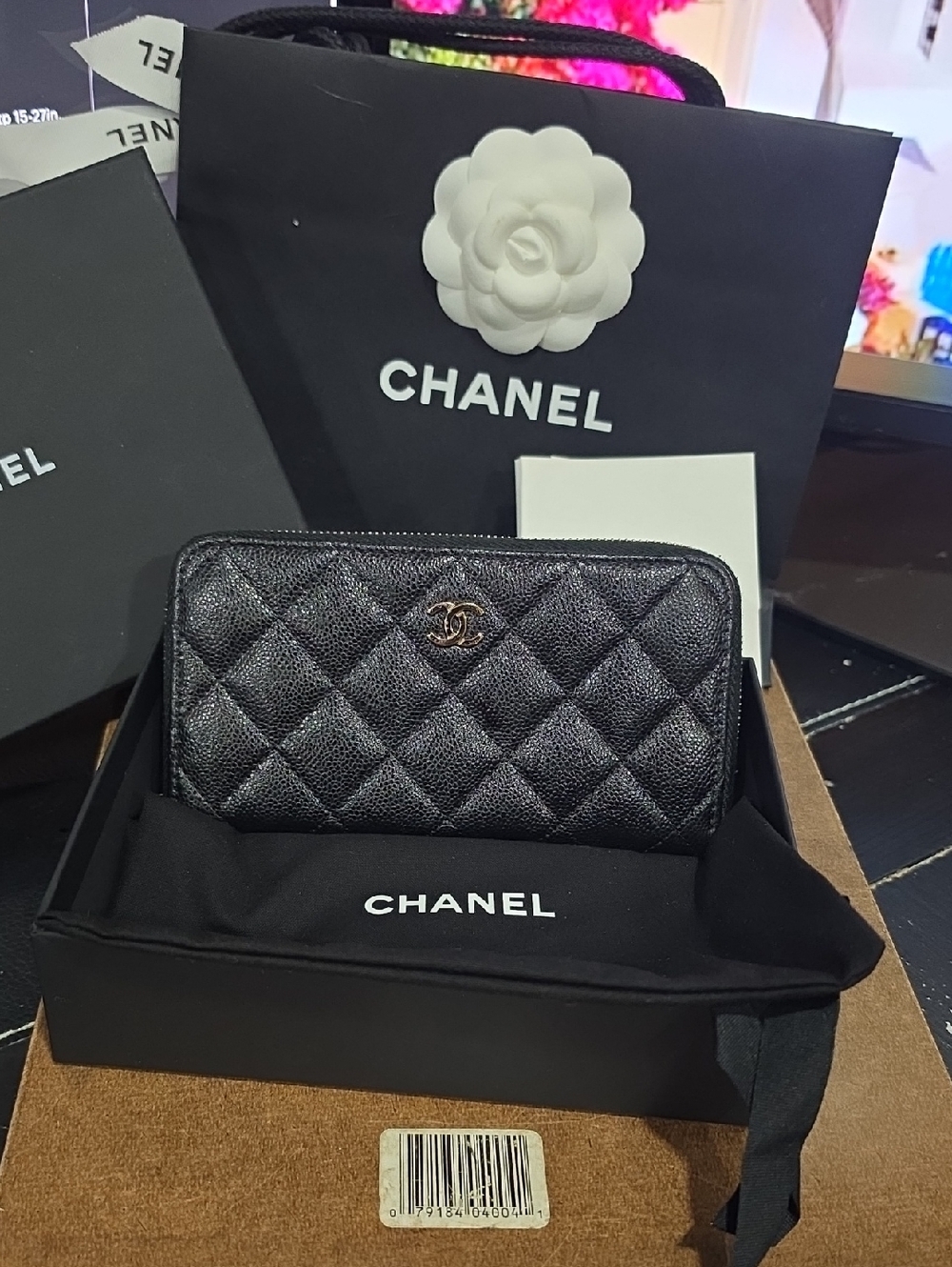 CHANEL Black Quilted Zip Around Wallet with CC Logo
